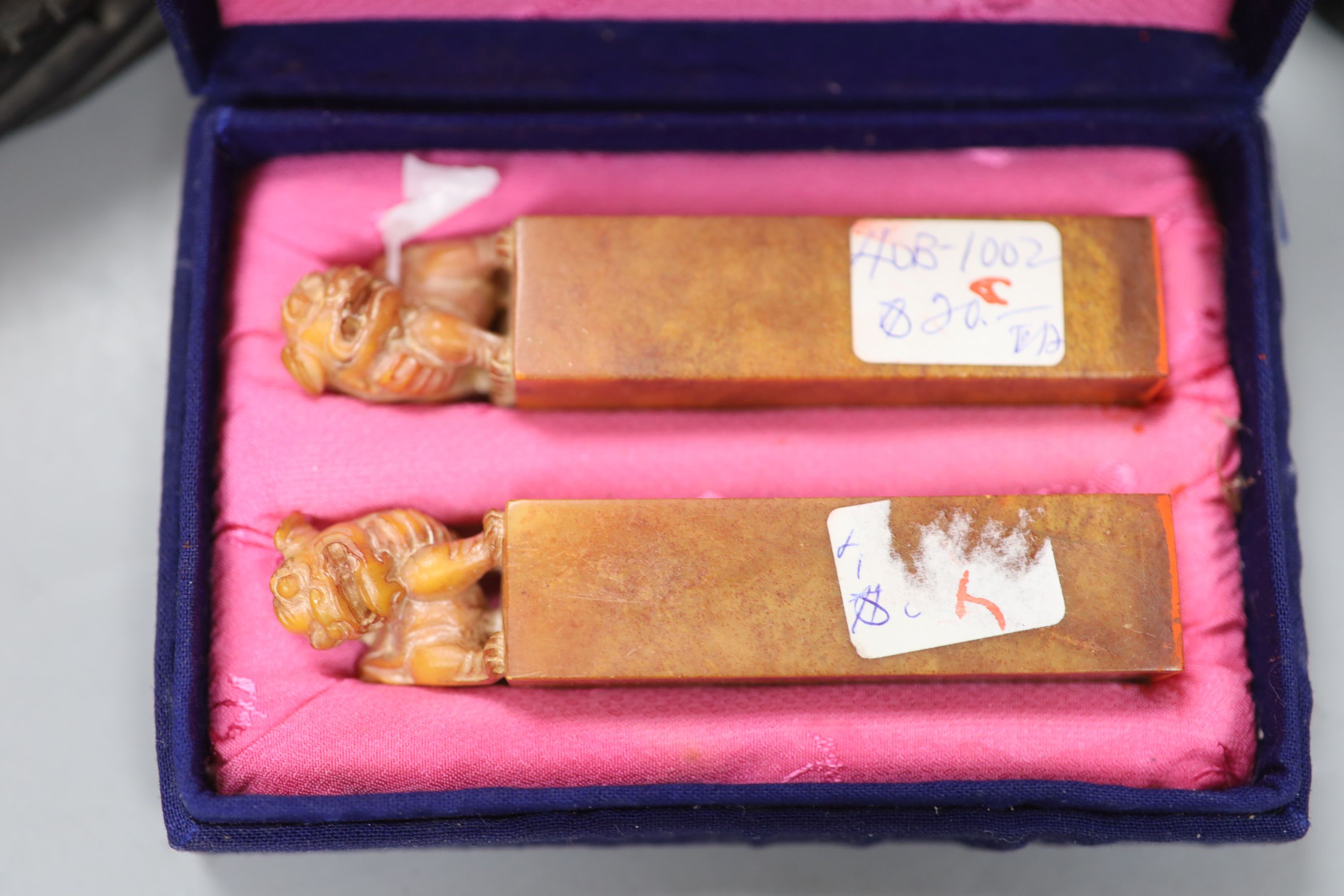 Two cased Chinese seals, a hardstone shaker and a carved ivory model of a junk on stand